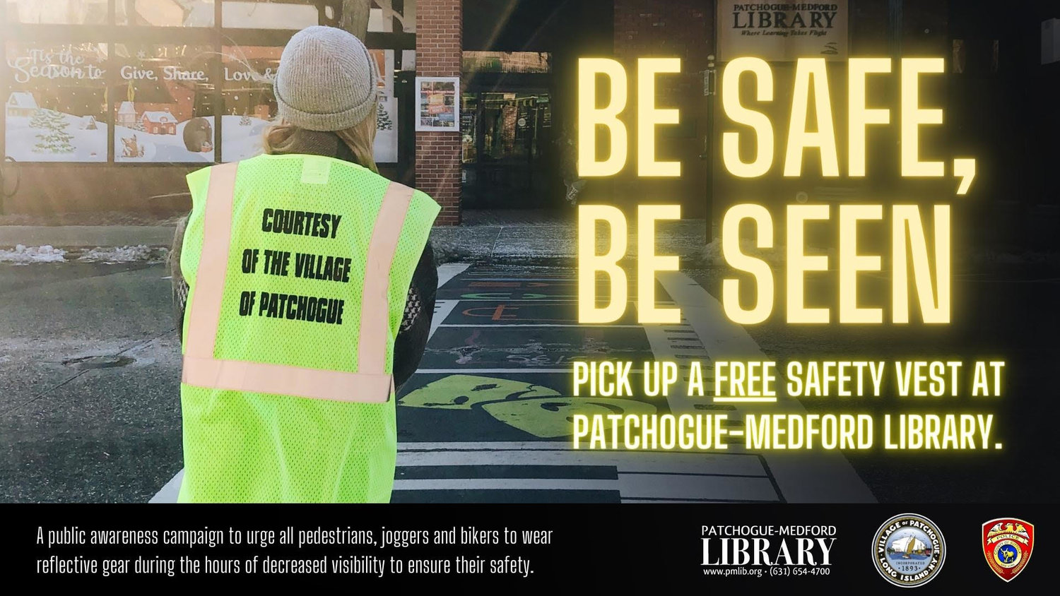 Patchogue-Medford Library employee Hanna Auer crosses the street, safely, in the new reflective gear.